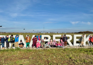 Zbiorowe zdjęcie na tle napisu "Siwaberek".
