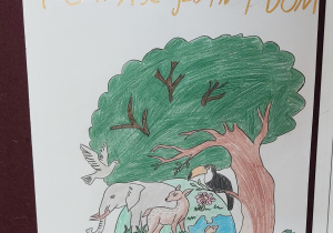 ludzka dłoń podtrzymująca kulę ziemską na której rośnie drzewo i znajdują się zwierzęta